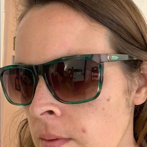 Sunglasses. Spy brand. Teal. Great condition.